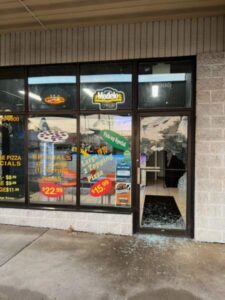 Broken Glass Frameless Door needs storefront repair service