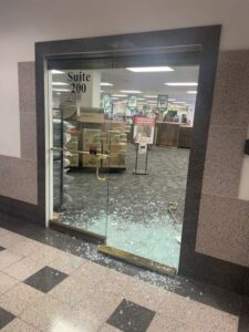 Broken Glass Frameless Door needs an immediate storefront repair