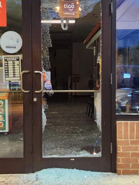 Broken Glass Storefront is replaced by a glass door replacement technician