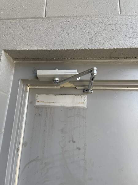 Broken Door Closer that needs immediate commercial door repair expert