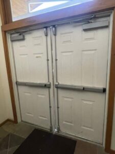 Double Entry Door Repaired by commercial door repair company