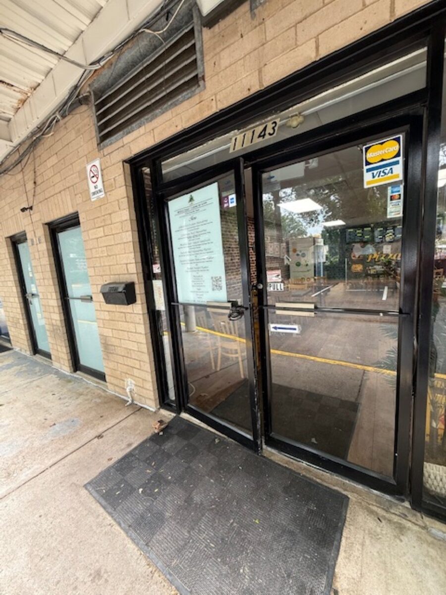 Commercial door repair for storefront and office doors.
